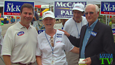 Bill McKown and Senator Dick Elliott talk with locals at the Shrimp and Jazz Festival in Little River, SC